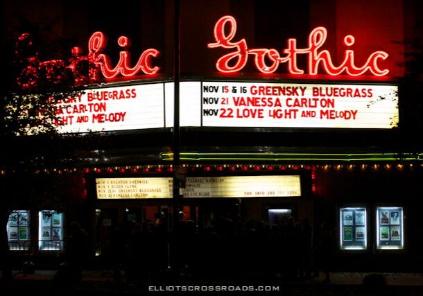 Gothic Theatre marquee with upcoming show dates.