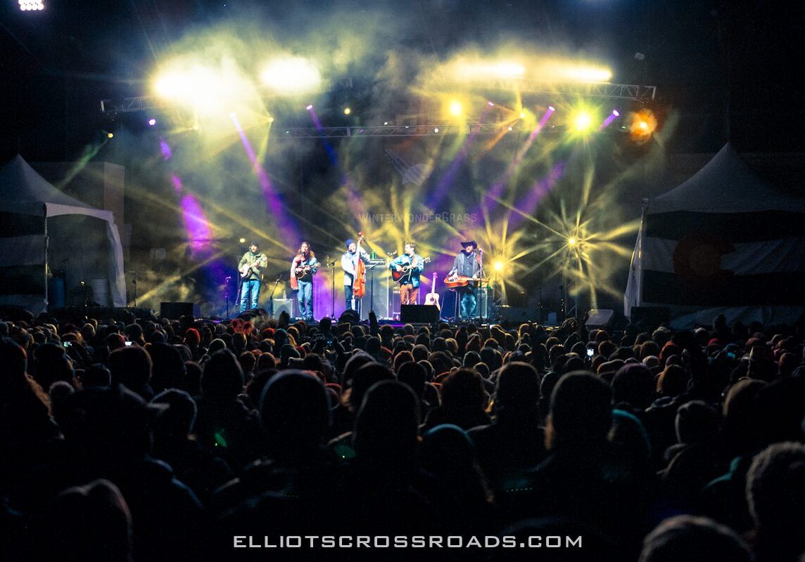 Live concert with colorful stage lights.