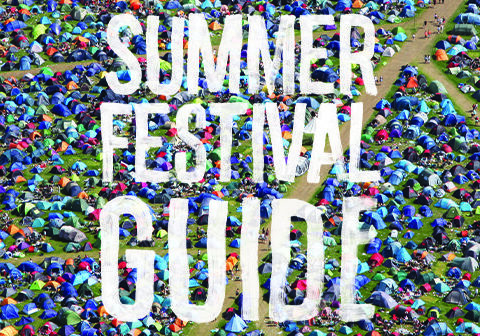 Crowded festival campsite with colorful tents.