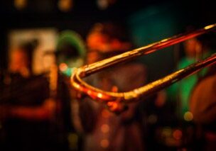Close-up of a trombone in concert.