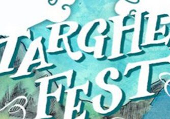 Colorful Targhee Fest poster with clouds.