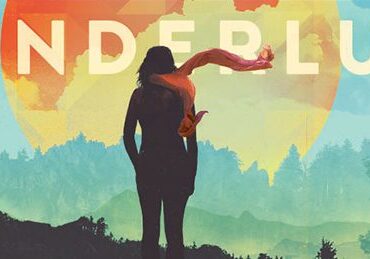 Silhouette of person under "Wanderlust" text.