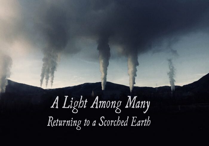 Dark clouds over landscape with inspirational text.