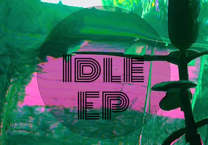 Abstract album cover with text and colors.