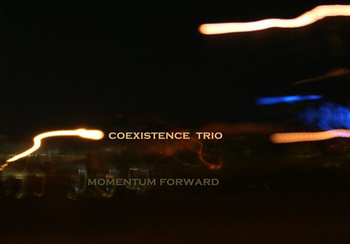 Blurry lights with "Coexistence Trio" text.