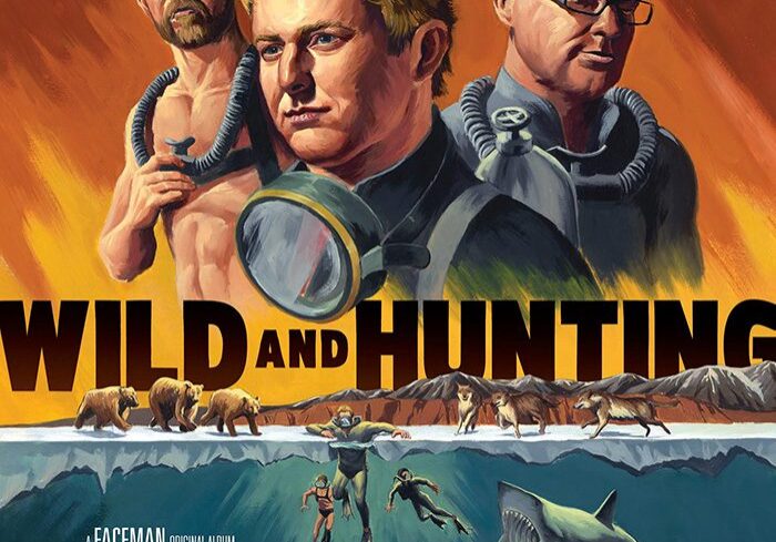 Three men in diving gear, wildlife background.