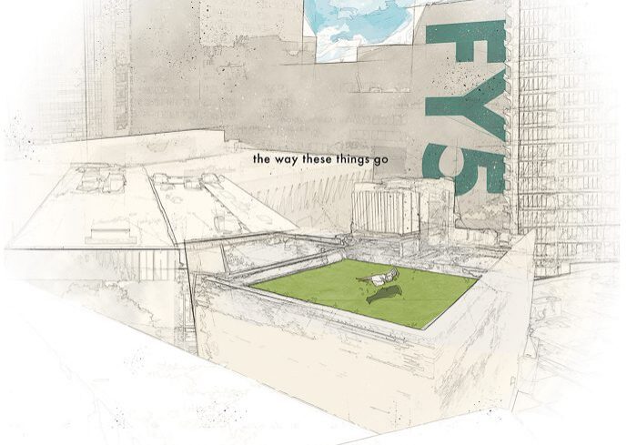 Rooftop scene with green area and buildings.