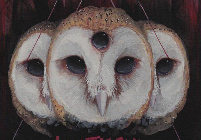Three owls with dark forest background.