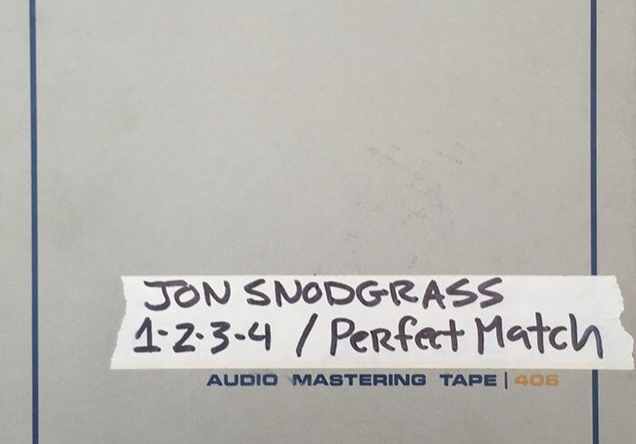 Audio mastering tape labeled "Jon Snodgrass" songs.