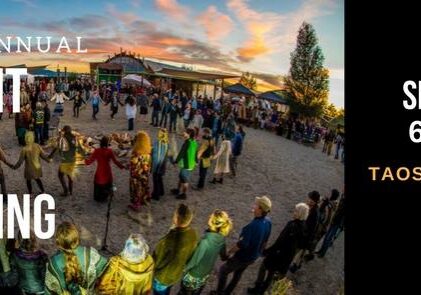 Outdoor gathering with people in a circle.