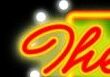 Colorful neon sign with cursive text.