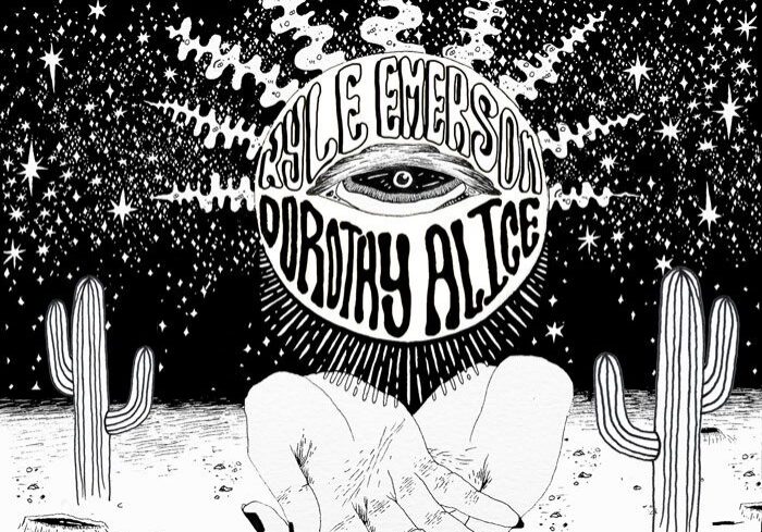 Surreal desert scene with cosmic eye.