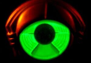 Glowing green and red circular design.