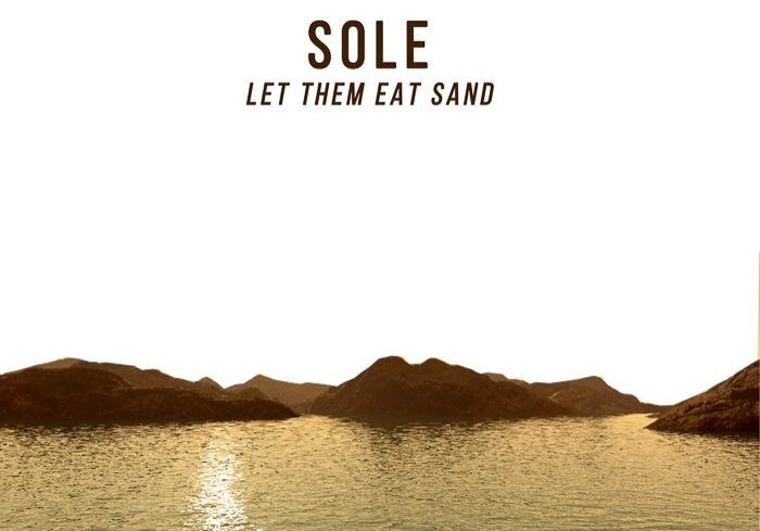 Album cover with desert and water.