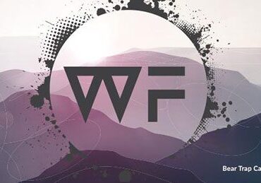 Abstract mountain landscape with WF logo.