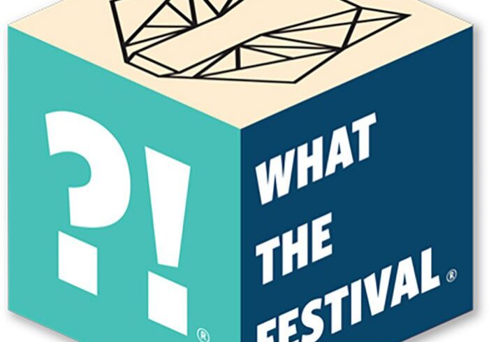 What The Festival logo on colorful cube.